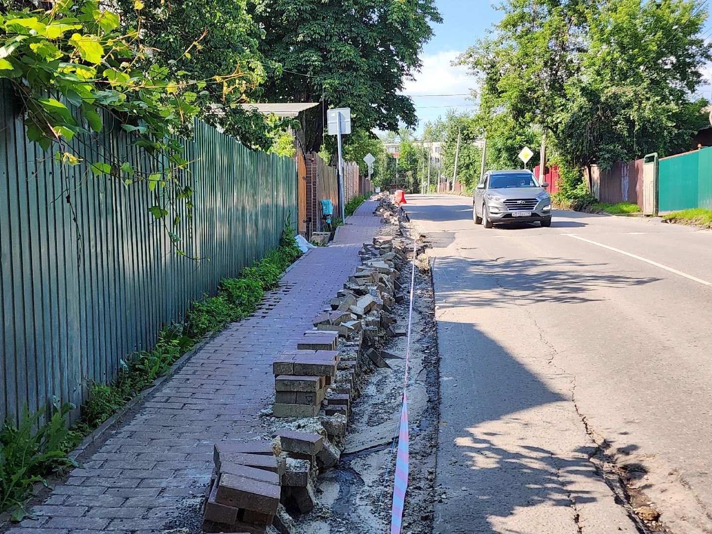 чехов, улица лопасненских ополченцев, дорожный ремонт, укладка бордюров, замена покрытия, ремонт дорог, госпрограмма московской области, развитие дорожного комплекса ,