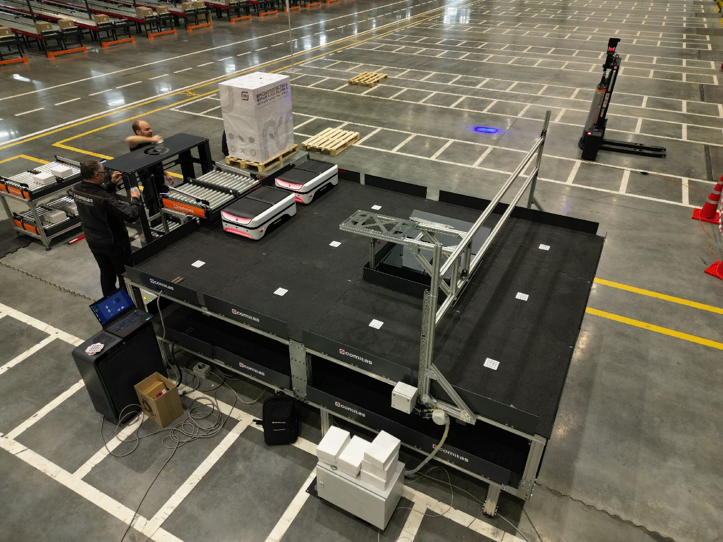 видео с коптера, роботизированный  распределительный центр, магнит в подольске, Роборука в магните подольск,