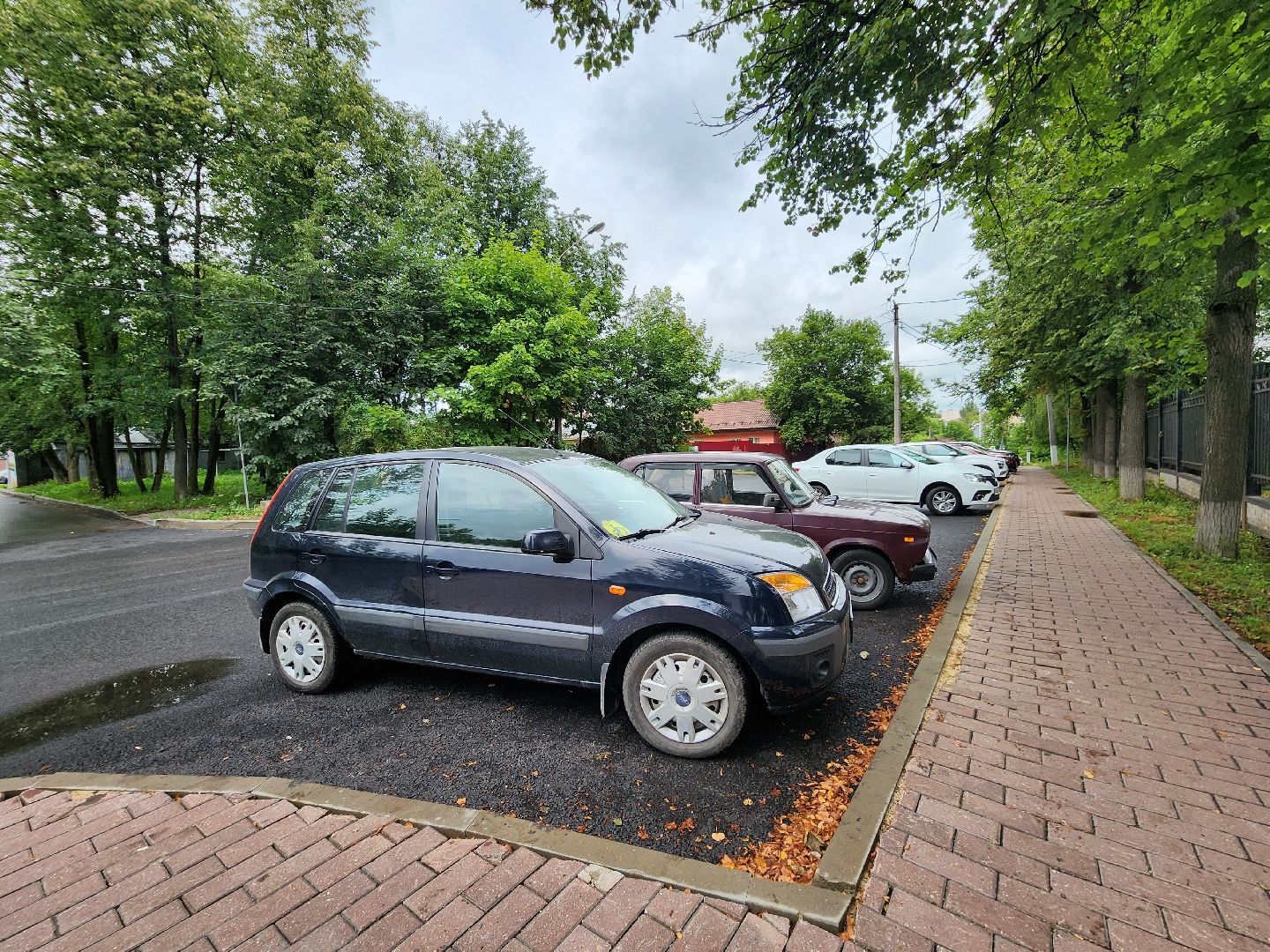 чехов, улица лопасненских ополченцев, дорожный ремонт, капремонт дороги, замена покрытия, новые бордюры, парковочные карманы, обновление проезжей части, тротуары, госпрограмма московской области, развитие дорожного комплекса, планы ремонта на 2025 год,