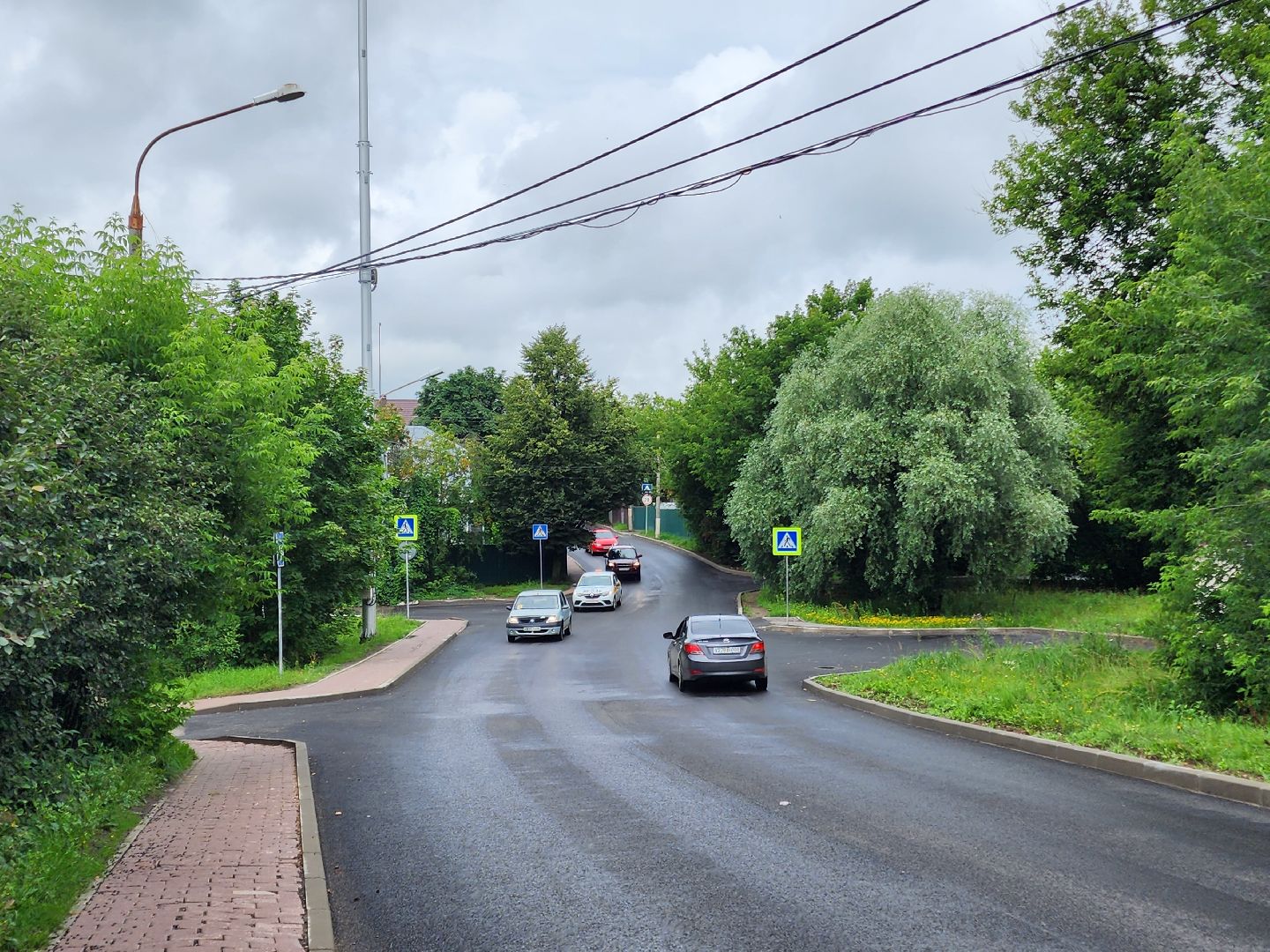 чехов, улица лопасненских ополченцев, дорожный ремонт, капремонт дороги, замена покрытия, новые бордюры, парковочные карманы, обновление проезжей части, тротуары, госпрограмма московской области, развитие дорожного комплекса, планы ремонта на 2025 год,