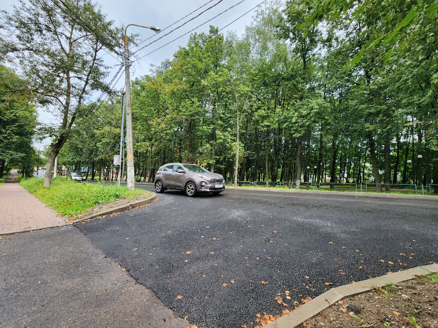 чехов, улица лопасненских ополченцев, дорожный ремонт, капремонт дороги, замена покрытия, новые бордюры, парковочные карманы, обновление проезжей части, тротуары, госпрограмма московской области, развитие дорожного комплекса, планы ремонта на 2025 год,
