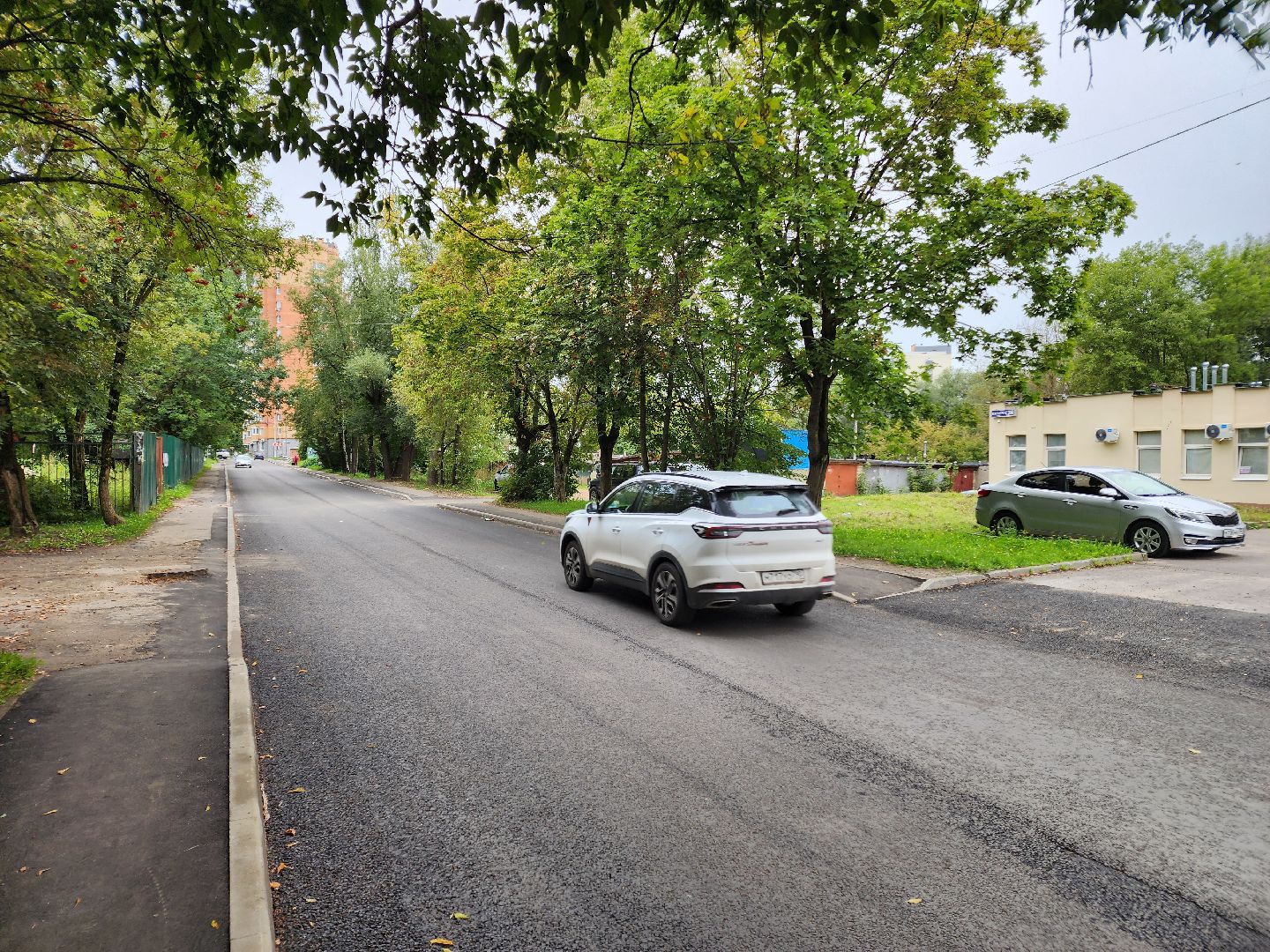 чехов, улица ильича, дорожный ремонт, капремонт дороги, замена покрытия, новые бордюры, разметка, дорожные знаки, пешеходные переходы, госпрограмма московской области, развитие дорожного комплекса, тротуары,