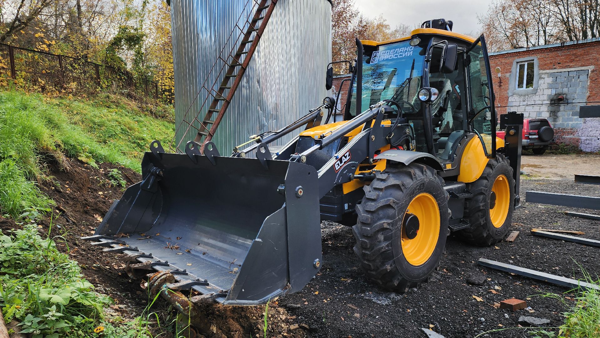 кашира, муп теплосеть, экскаватор-погрузчик, новая техника, губернаторская программа, ремонт, благоустройство,